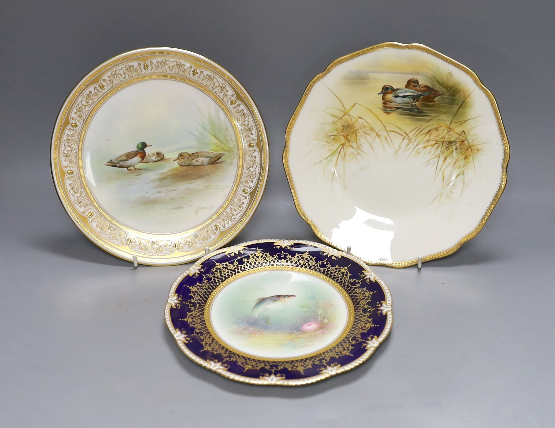 An Aynsley fish painted plate by S Micklewright, A Royal Doulton mallard or wild duck painted cabinet plate by J. Hancock and a Cauldon duck painted plate by D. Birkbeck (3)